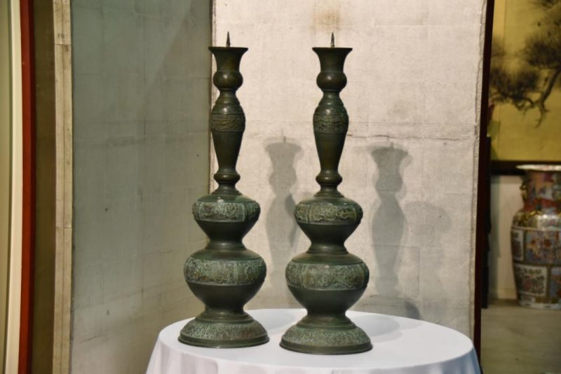 A pair of bronze Candlestands
