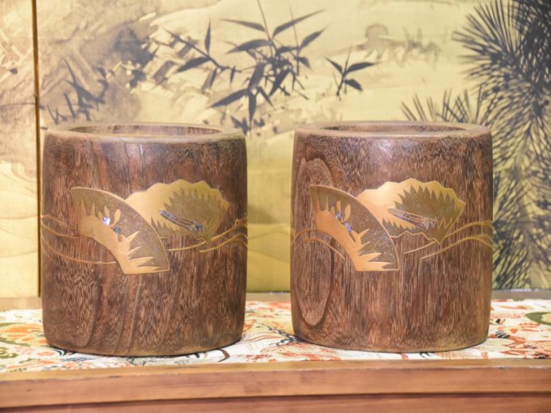 A Pair of Wooden Hibachi with Gold Maki E painting.